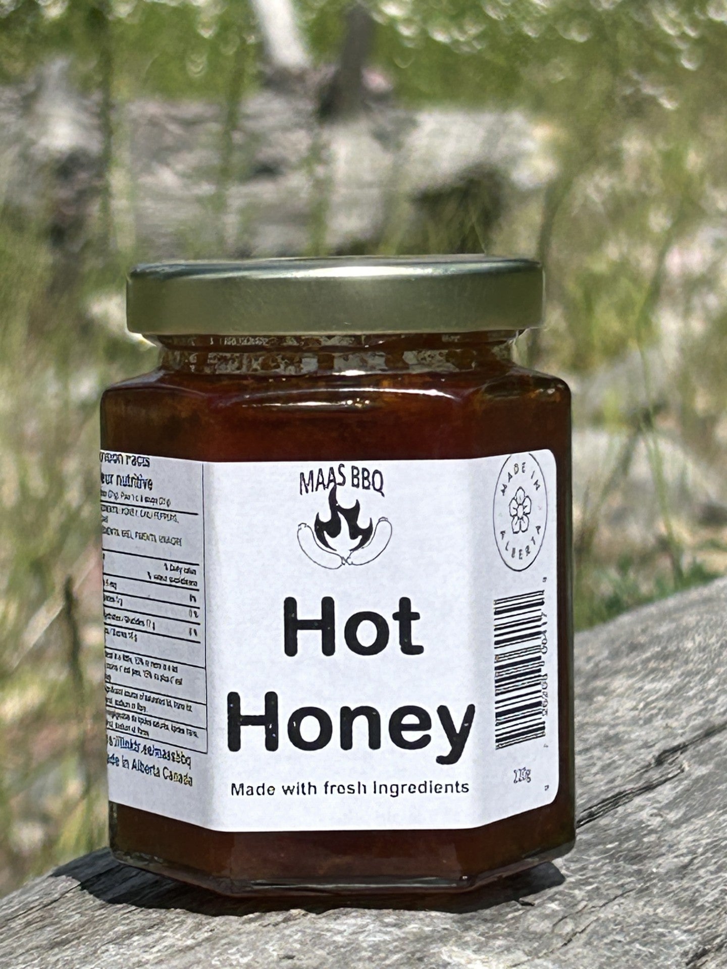 Maas BBQ Hot Honey jars made with fresh, natural ingredients and no additives. The perfect spicy glaze for pizzas and meat dishes. Made in Alberta Canada