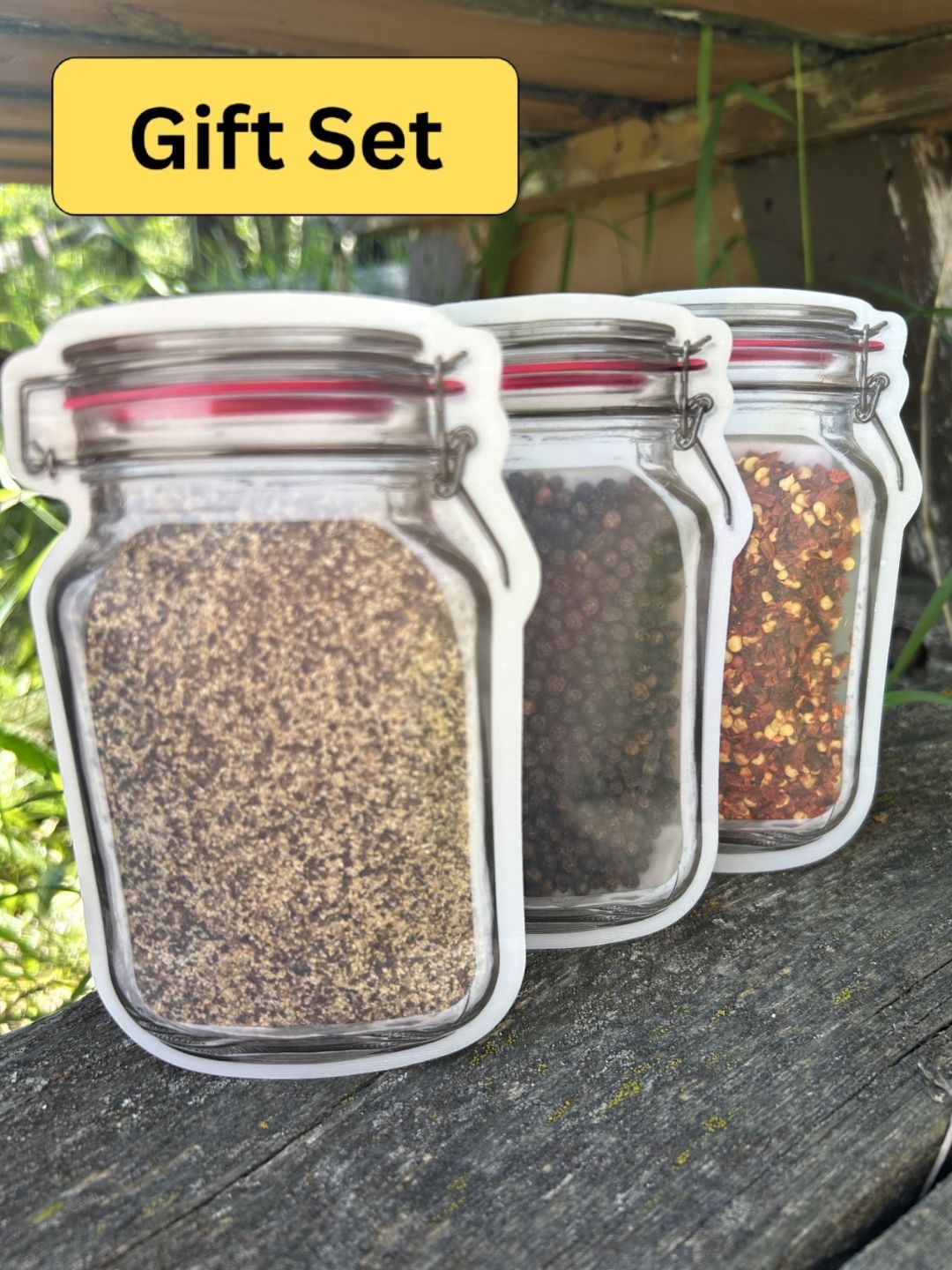 Three Mason Jar bags containing smoked SPG seasoning, black peppercorns, and red pepper flakes – Maas BBQ foodie gift set, unique Alberta Canada made cooking spices for BBQ recipes, Canada’s favorite great gift for cooking enthusiasts.