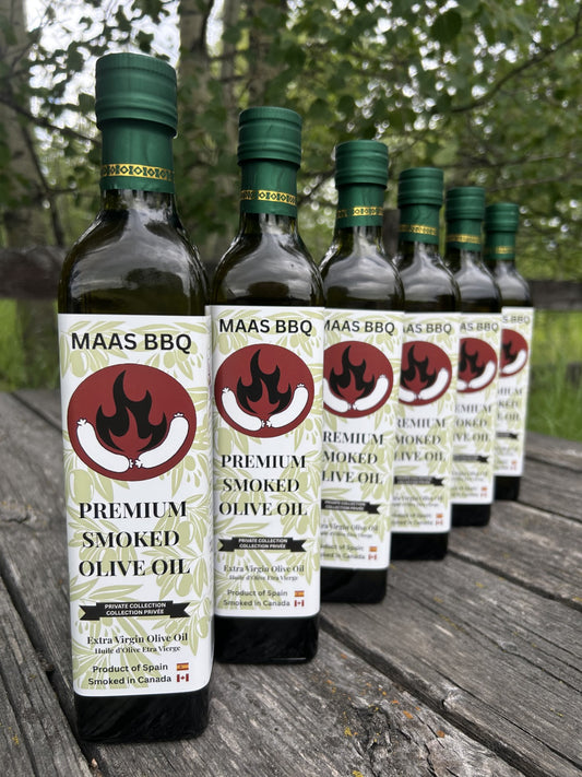Maas BBQ Premium Smoked Olive Oil bottles, Alberta Canada gourmet extra‑virgin olive oil infused with smoked spices, ideal for BBQ cooking, chef recipes, and foodie gifts – a unique, premium smoked olive oil made in Canada, perfect for executive culinary use and great gift for cooking enthusiasts. Maas BBQ Premium Smoked Olive Oil – Alberta‑Made Gourmet Cooking Oil, Canada’s Favorite Unique BBQ & Chef’s Executive Gift for Foodie Recipes & Smoked Spices
