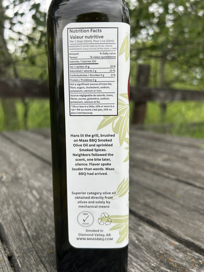 Maas BBQ Premium Smoked Olive Oil – Unique Alberta‑Made Cooking Blend for Foodie Chefs | Gift Idea with Smoked Black Pepper Flavor. Maas BBQ Premium Smoked Olive Oil bottle, a unique Alberta Canada‑smoked extra‑virgin olive oil blend perfect for foodie chefs to use in BBQ, grilling, dressings, marinades, and gourmet cooking, featuring smoked black pepper flavor – an ideal gift for cooking enthusiasts.