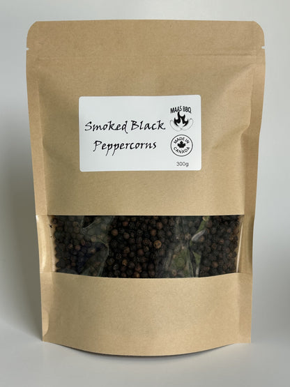 Maas BBQ Smoked Black Peppercorns in three sizes: a 30g trial pouch, a 300g chef size bag, and a unique mason jar re-sealable pouch. A premium, all-natural smoked black pepper for gourmet cooking.