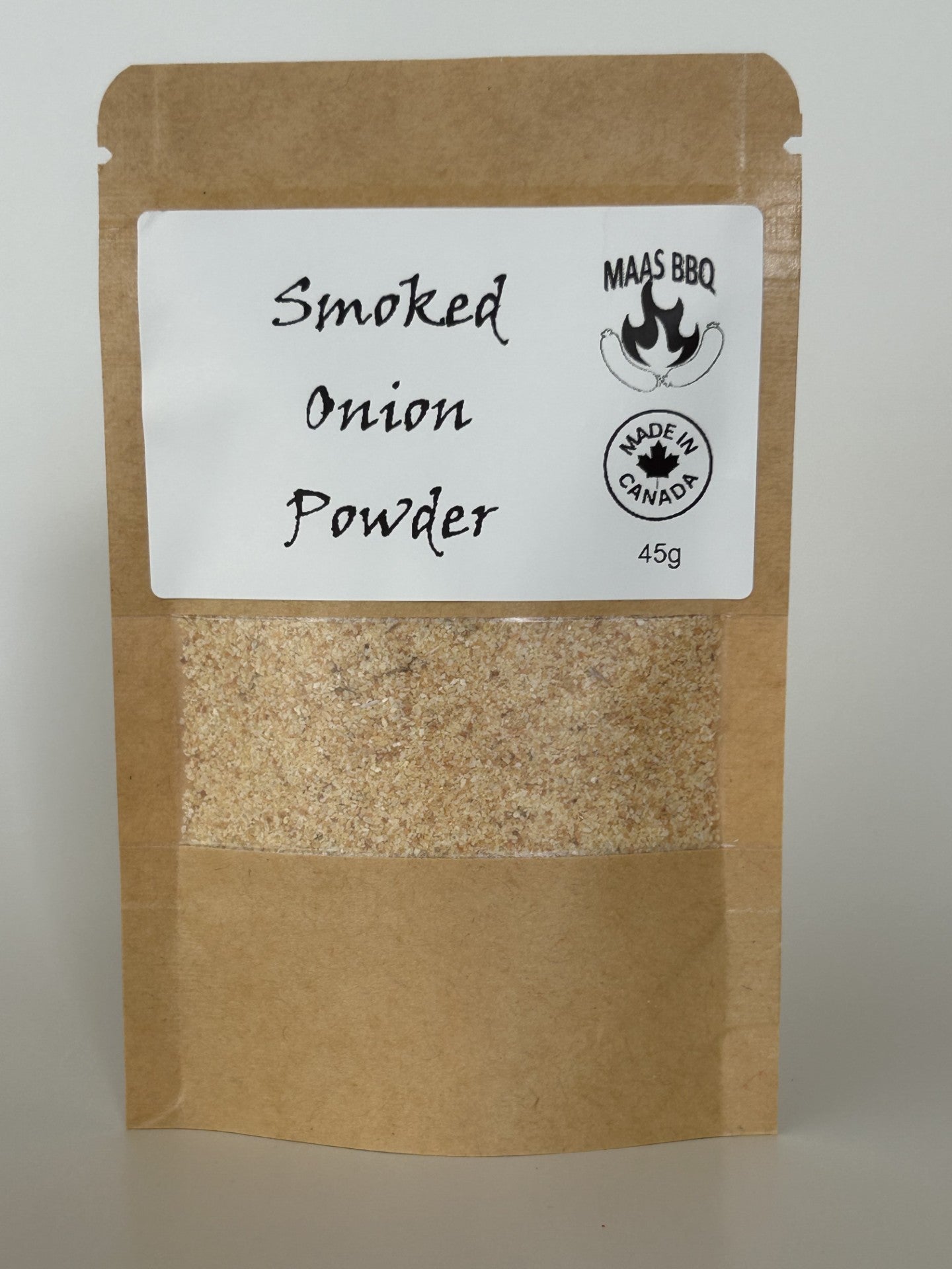 Maas BBQ Smoked Onion Powder, a 45g kraft pouch of gourmet smoked onion made in Alberta, Canada. This unique, high-end blend is perfect for chefs and foodies to enhance BBQ, cooking, and various dishes, and makes an excellent gift for culinary enthusiasts.