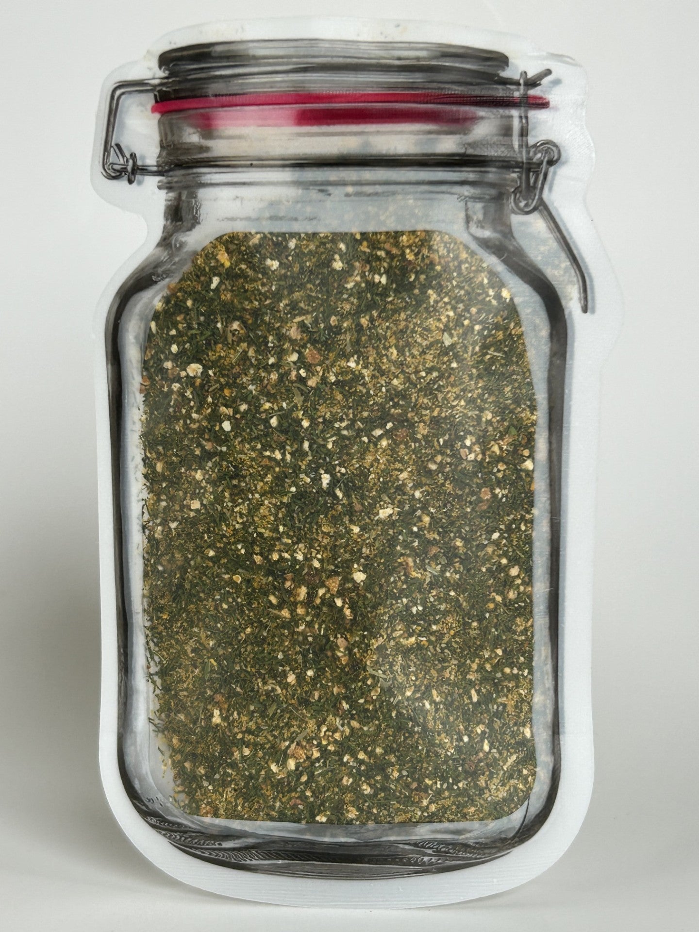Re‑sealable mason jar pouch filled with a unique Maas BBQ dock and dine seafood spice blend, a flavorful foodie gift.