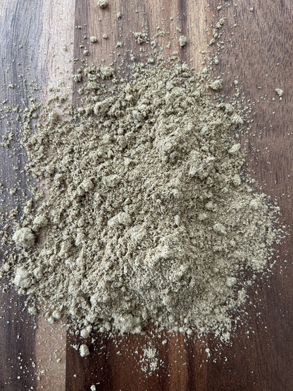 Close‑up of a pile of unique smoked cumin powder, a specialty Maas BBQ spice blend made in Alberta, Canada, perfect for chefs and foodies to enhance cooking, grilling, and BBQ recipes, ideal as a unique culinary gift. Unique Smoked Cumin Spice Blend – Maas BBQ Chef’s Secret for Flavorful Cooking & Foodie Gifts, Made in Alberta, Canada